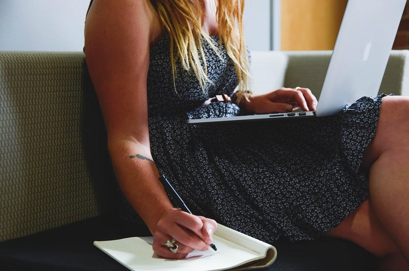 Business Woman Writing Plan
